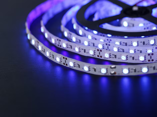 Curved LED light strip emitting bright purple illumination.