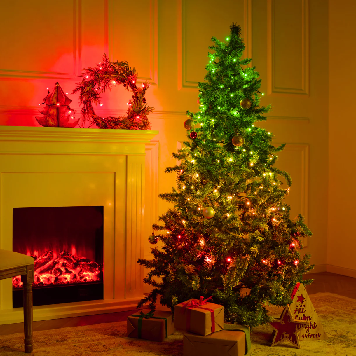  festive living room with a lit-up Christmas tree and a fireplace.